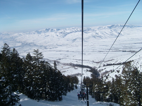 Inkom, ID: On the chair lift at Inkoms local ski Area called Pebble Creek looking down over the city of Inkom.