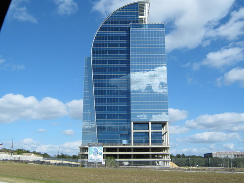 Orlando, FL: cool building with reflective clouds