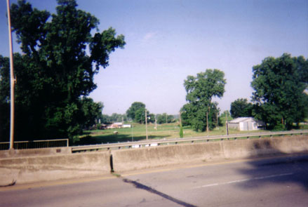 Moffett, OK: Looking toward Moffett, Oklahoma after having crossed the bridge from Fort Smith, Arkansas into Oklahoma.