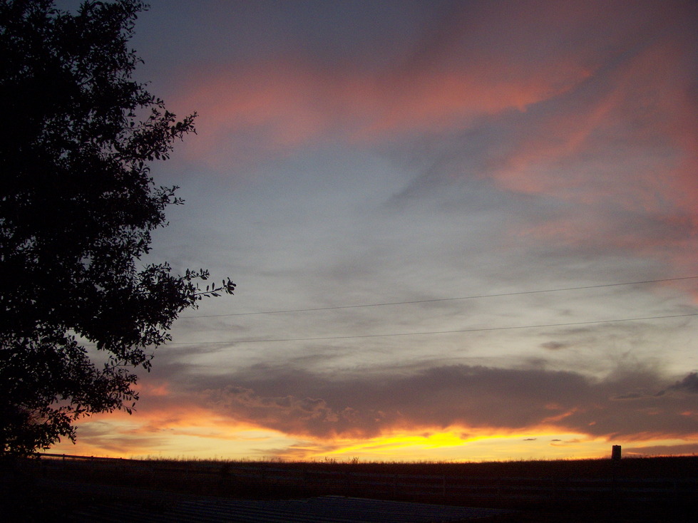 Astatula, FL: Sunset looking across an empty field towards Lake Harris from Washington Ave.