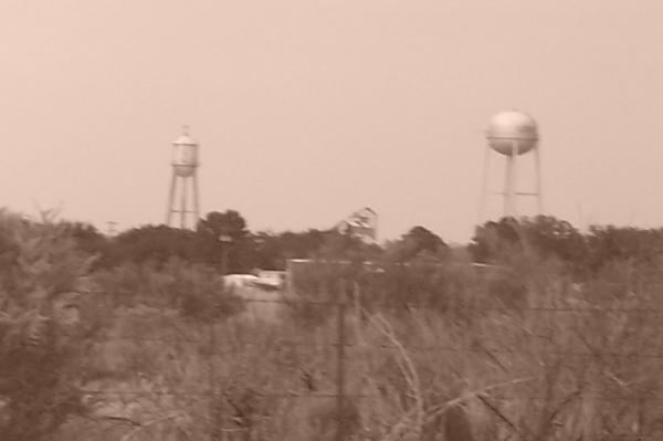 Loving, NM: distant view of loving water towers