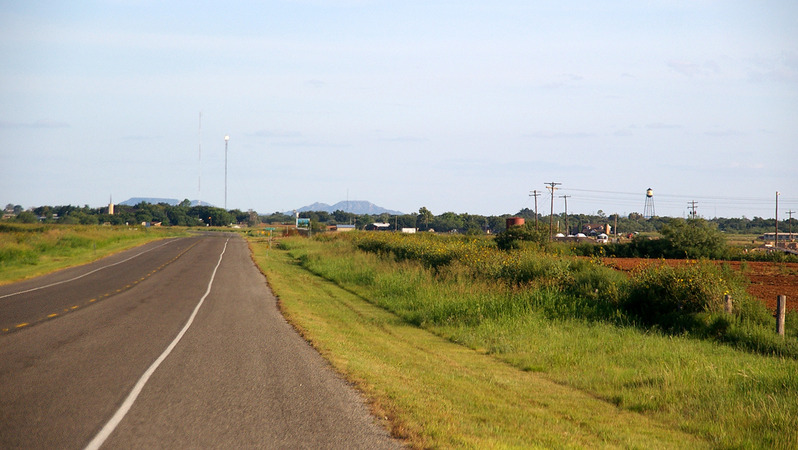 Jayton, TX: APPROACHING JAYTON from the north along Highway 70, the silhouette of the Double Mountain is visible to the southeast.