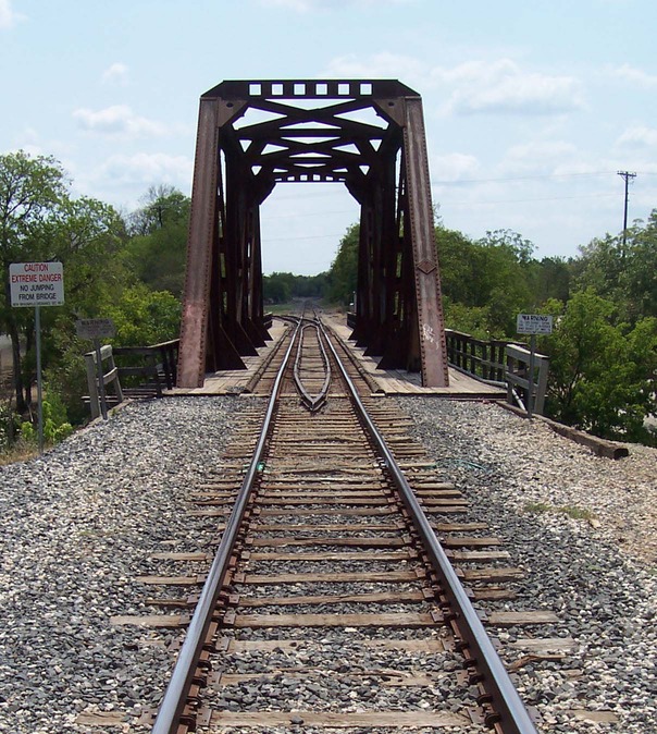 New Braunfels, TX: Train bridge over the Comal River in New Braunfels, TX.