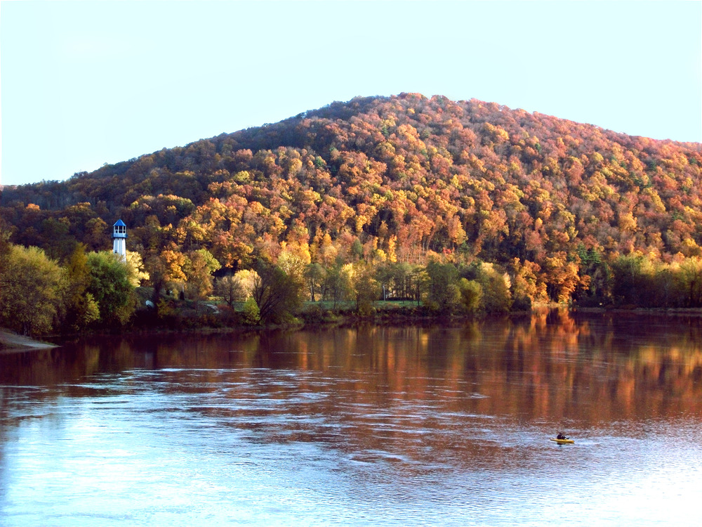 Tionesta, PA: View from the bridge at sunset.