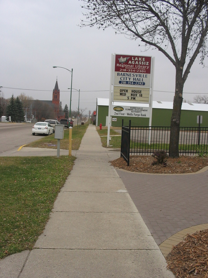 Barnesville, MN: Sign at City Hall and Library, Barnesville, MN