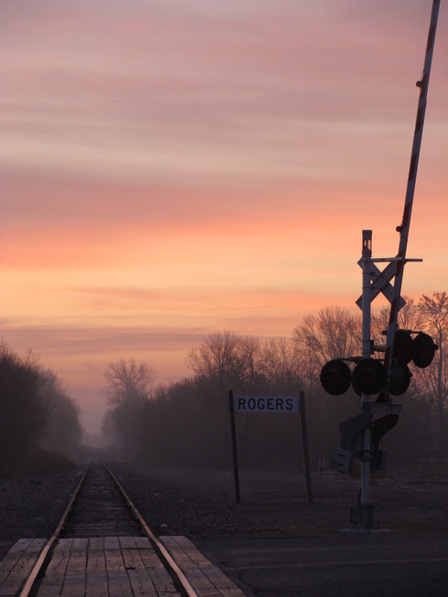 Rogers, MN: Sunsrise on railroad tracks on the corner of Main Street and 129th Ave N