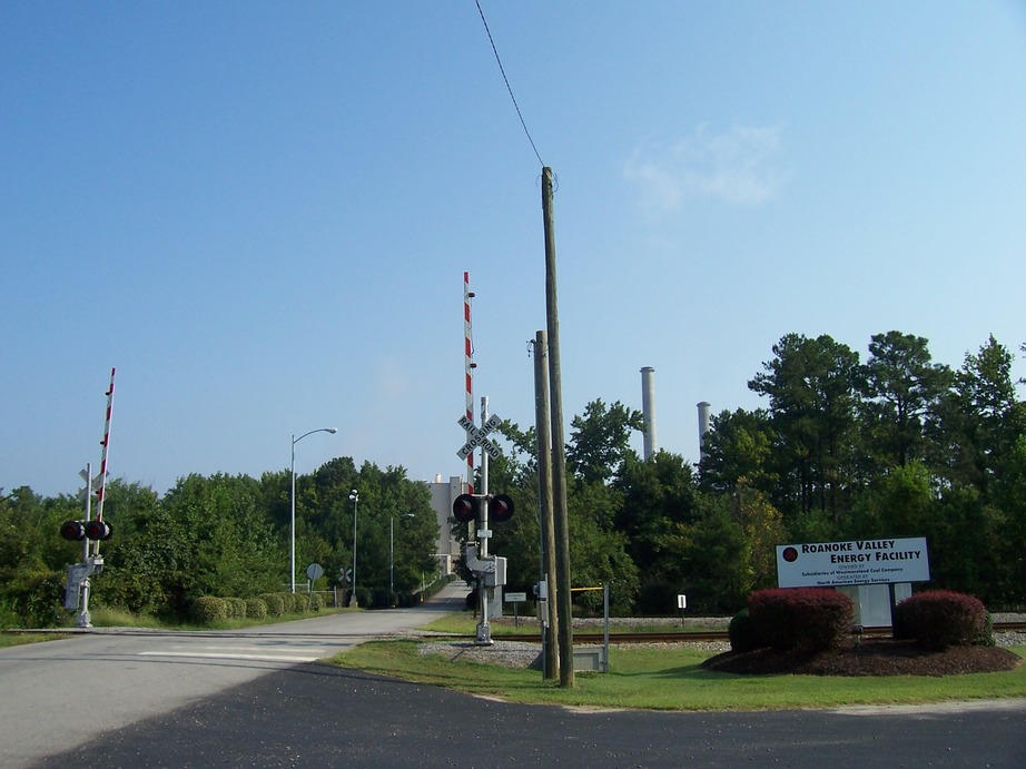 Weldon, NC: An access road to the Roanoke Valley Energy Facility crosses some rail tracks