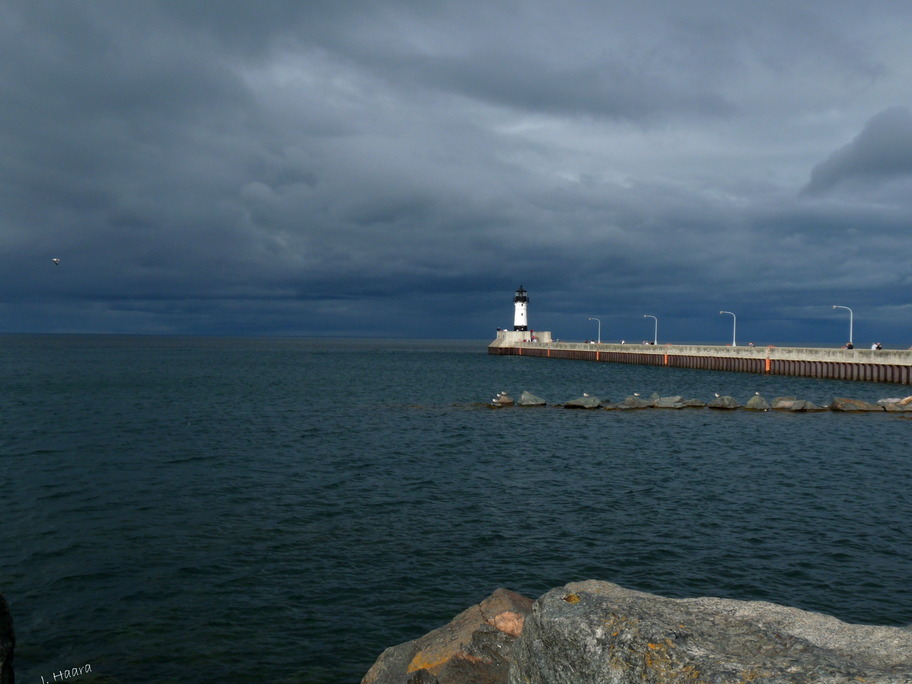 Duluth, MN: Stormy skies over Duluth lighthouse at Canal Park in Duluth, Minnesota