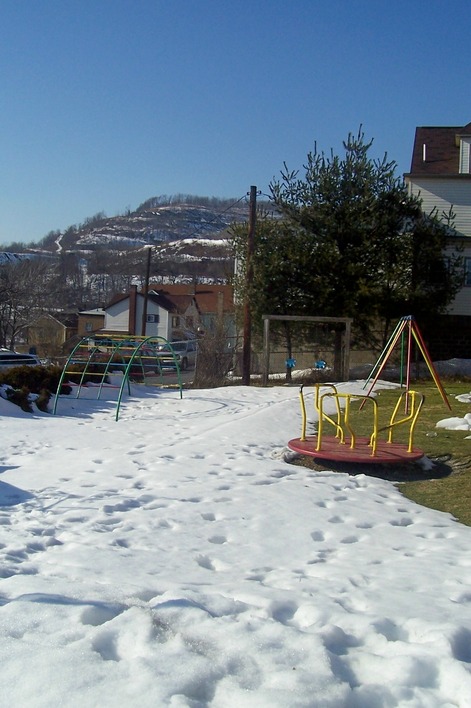 South Fork, PA: The Ice Will Met & Then We'll Go'Round - South Fork's playground behind the library.