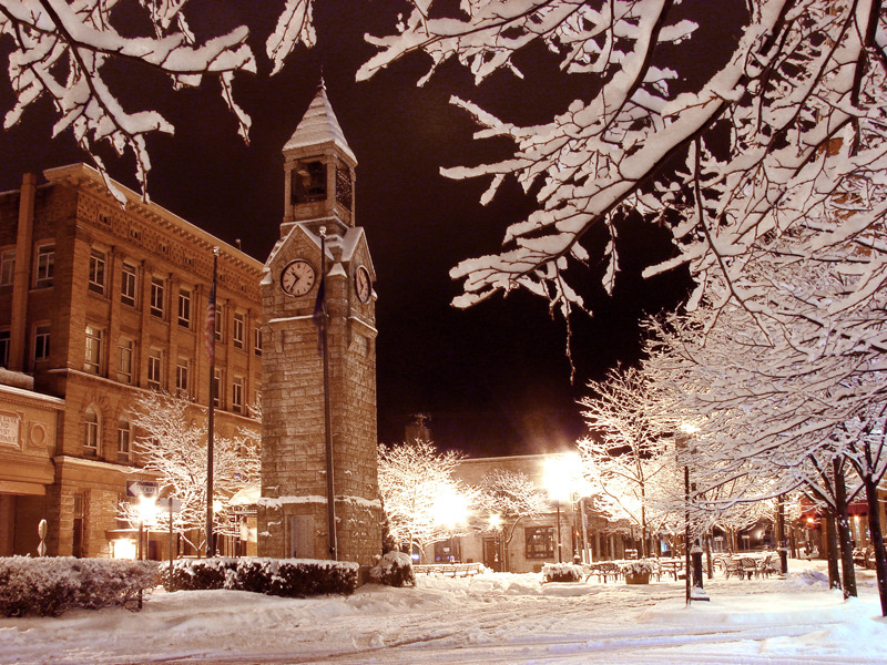 Corning, NY: The clock tower on Market Street on a silent snowy night.