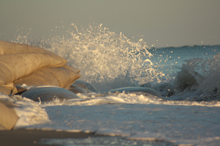 Ocean Isle Beach, NC: Man vs. Sea Sandbags at the East end of Ocean Isle Beach, NC