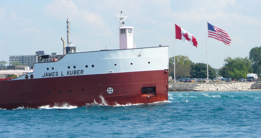 Port Huron, MI: Beneath 'Blue Water Bridge' looking across St. Clair river toward Sarnia, Ontario, Canada.