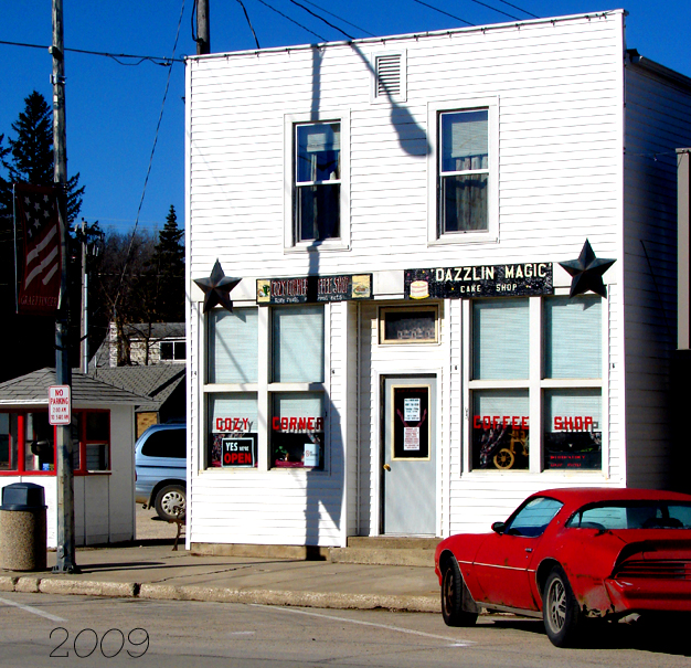 Graettinger, IA: DOWNTOWN GRAETTINGER; Yes it's true the Cozy Corner Cafe has teamed with the Magic Cake Bakery, in a marriage of perfect harmony. If only the rest of us could cohabitate so swimmingly.