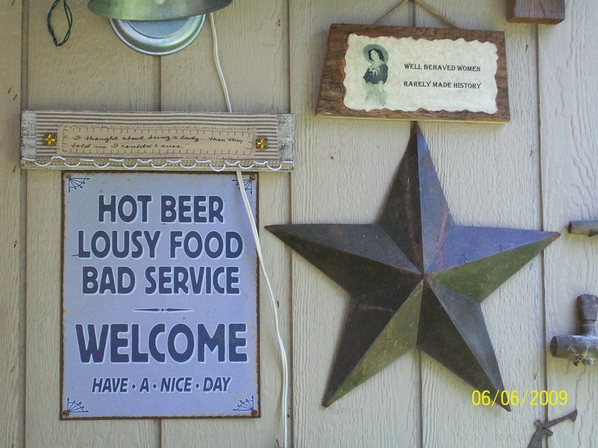 Holland, TX: Signs on the front of our workshop out back...just for fun!