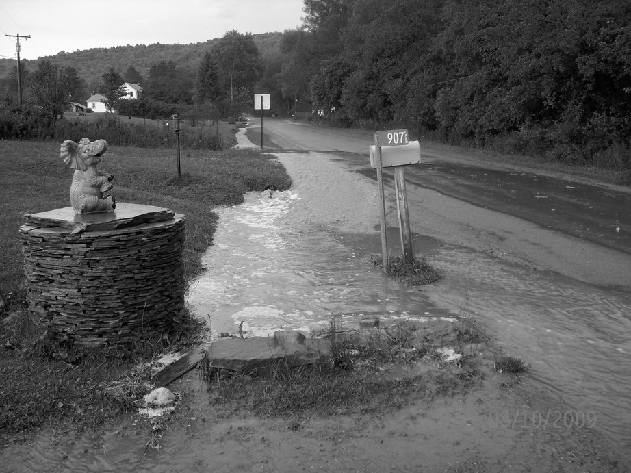 Limestone, NY Summer storm 2009 looking up Loney Hollow Road photo