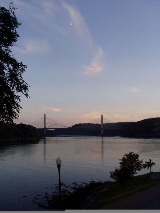 Bucksport, ME: A view of the new bridge from the river walkway in the town