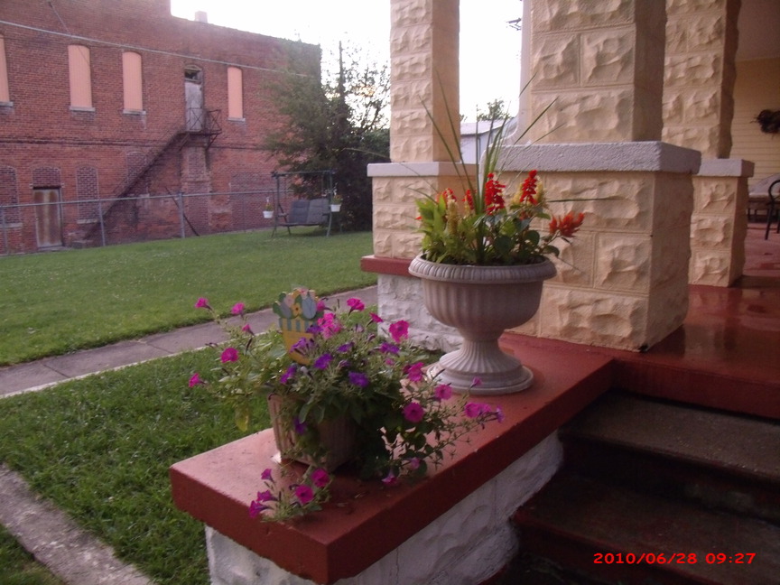 Eaton, IN: My home...flowers on porch..harris street