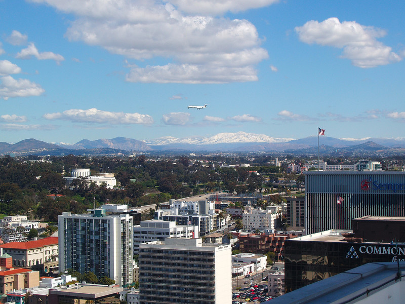 San Diego, CA: San Diego_Snow Mountains and Airplane and Flag from Downtown