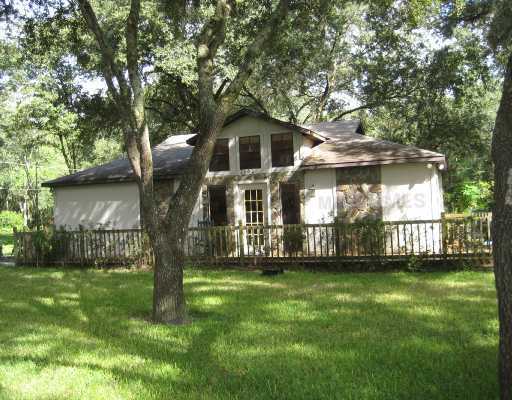 Lutz, FL: Call today..Available Feb. 1, 2011--This is not your ordinary one bedroom rental! It is a single family home and it has a fenced yard! All for $925.00 per month. (Will consider pets- conditional per owner's discretion- if accepted- a pet deposit of $200.00 is required.) Included in your rent each month is your: Cable TV, Grounds Maintenance, WIFI internet, Laundry (washer and dryer included inside of home.) Garbage, Water & Sewage. This one bedroom home has major style and has bee meticulously cared for! It is very private with trees galore! Off street parking pad. Updated kitchen appliances. The home sits on approximately 2.5 gated acres off Livingston Avenue. Country living while being less than 15 minutes from USF, North Tampa, New Tampa, and Land O Lakes/Wesley Chapel. Local schools are all A-rated as well. Home has vaulted ceilings in open great room. Kitchen has large breakfast bar with plenty of cabinet and counter space. Over sized bedroom has walk-in closet. Bathroom has full shower and tub. Neutral paint colors; updated cabinets and fixtures; tile and pergo flooring throughout. Exterior also has wrap around deck and screened + covered lanai. Must see to appreciate this tranquil retreat! Brand new energy wise A/C will also save you money on electric bills! No more than 2 occupants. Must have references and good credit required. $60.00 application fee per applicant 18 and over. Smokers must smoke outdoors on covered porch. Contact: 813-967-7165- or 813-948-3835 or email.