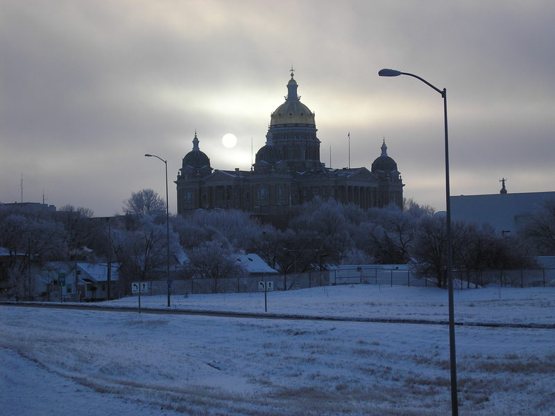 Des Moines, IA: state capital/12-27-2010/frost on the trees/sun coming up behind the clouds