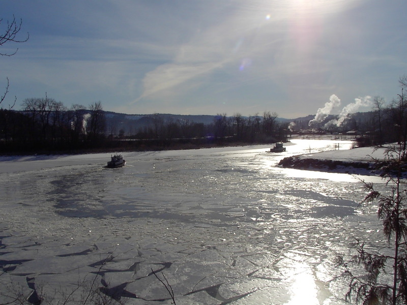 St. Maries, ID Tugs breaking up ice on the St. Joe River in St