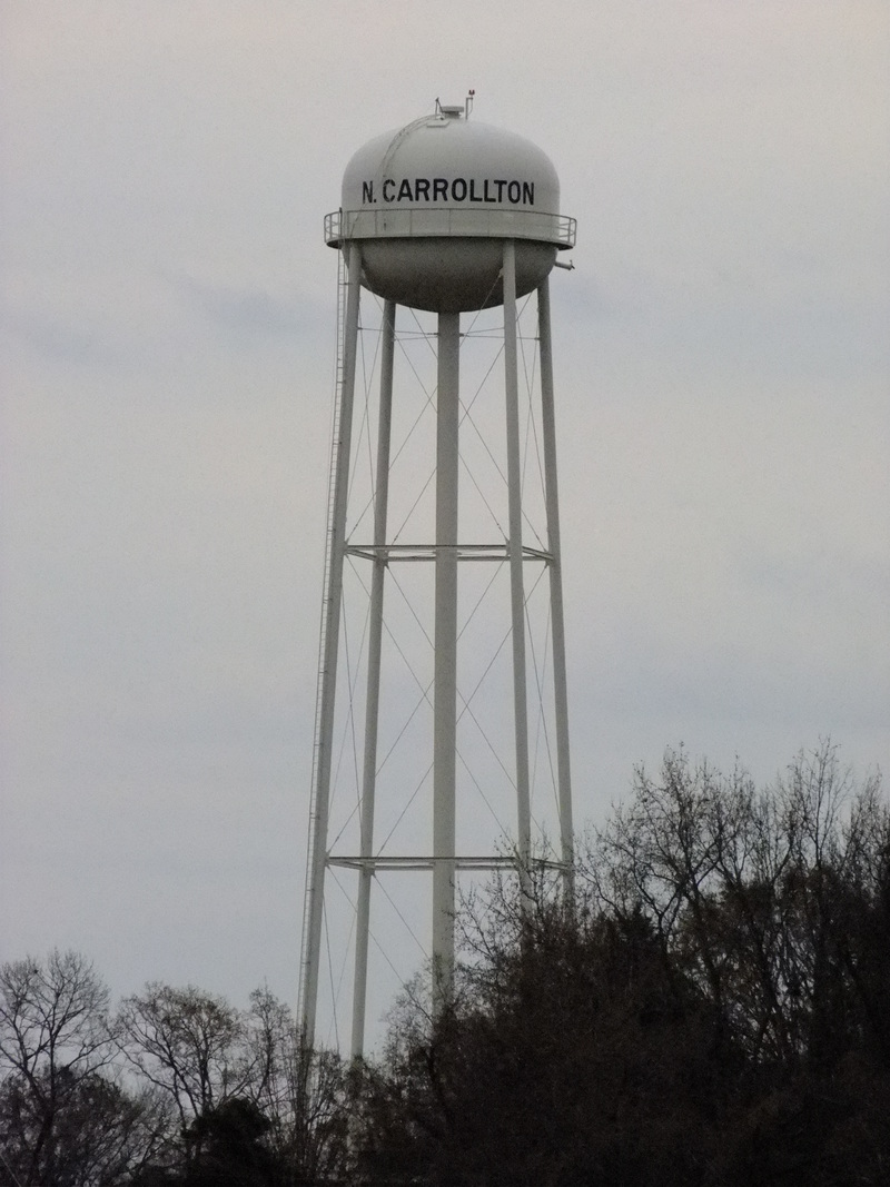 North Carrollton, MS: The 1st picture is a picture of the main strip in North Carrollton. The 2nd picture is of the North Carrollton water tower.