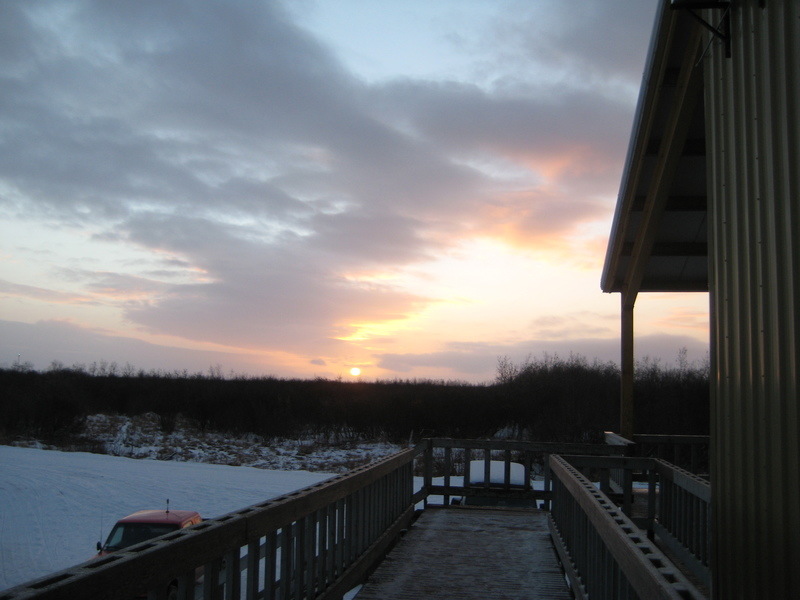 Alakanuk, AK: Winter Solstice Sunrise off the school deck