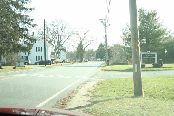 Pelham, NH: This crosswalk leads from the senior center to the funeral home. Comical? Efficient? You be the judge.