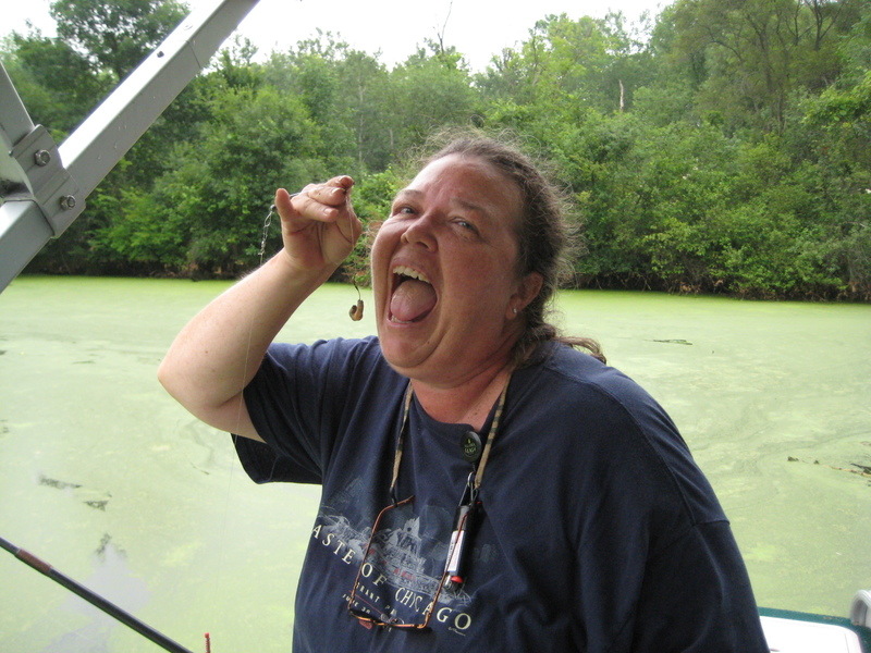 Camp Lake, WI: Marion eating a worm