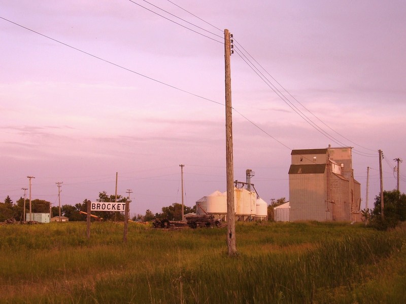 Brocket, ND: Brocket, ND evening near old RailRoad sign and town grain elevator