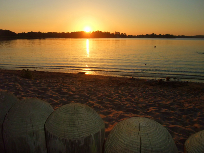 Winnsboro, TX: Lake Winnsboro's sandy beach at sunset