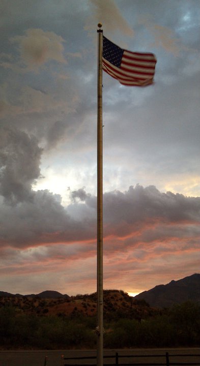 Tonto Basin, AZ: American Flag in Front of Tonto Basin Post office at sundown