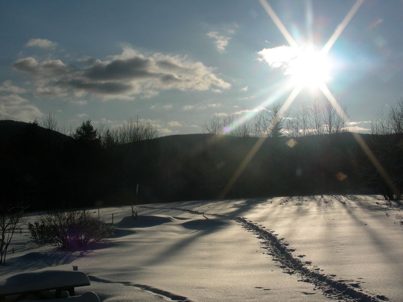 Brownfield, ME: The winter sun over the Burnt Meadow Mountains