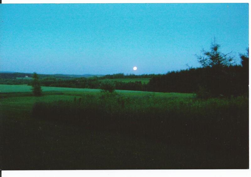 Limestone, ME: Over-looking a neighbor's potato field on a summer night from Mountain View dr.