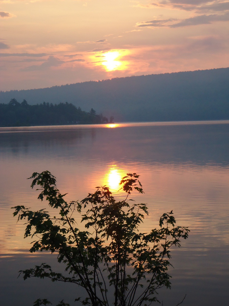 Hartland, ME: This is sun rise on great moose lake hartland maine off our dock