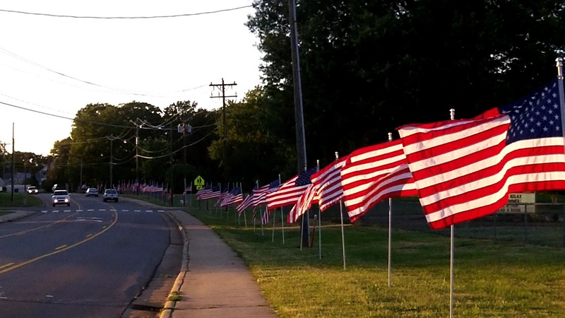 Walkertown, NC: Flags flying on Main Street in front of the Walkertown Library for Flag Day 2012