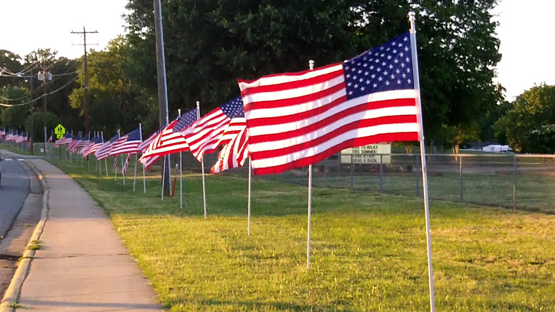 Walkertown, NC: Flags flying on Main Street in front of the Walkertown Library for Flag Day 2012