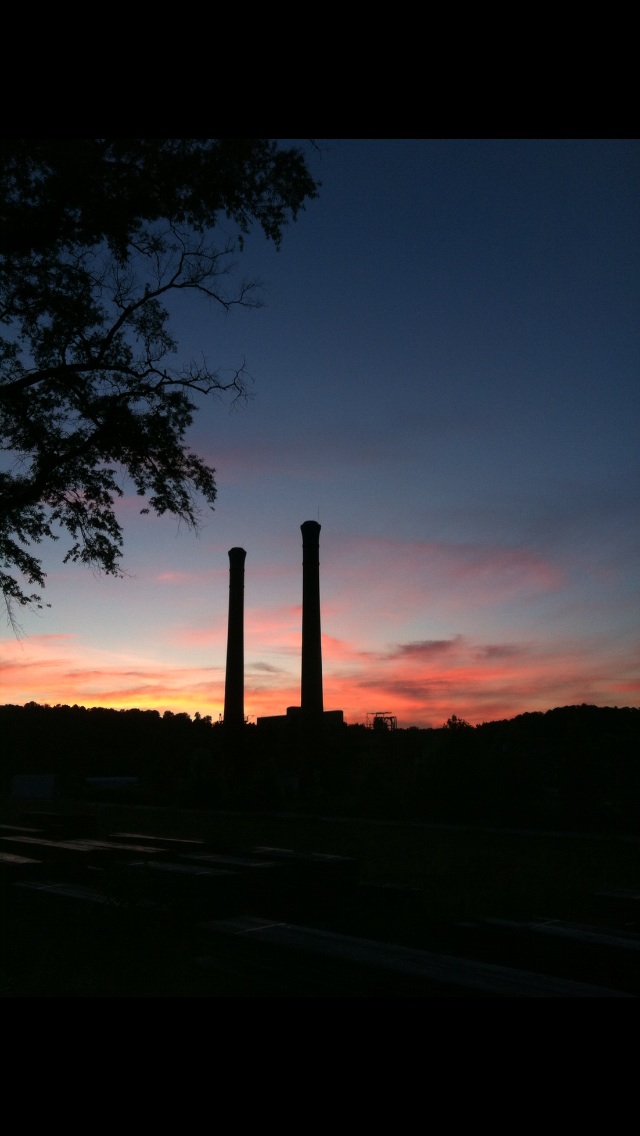 Lindale, GA: Lindale Mill smokestacks at sundown.