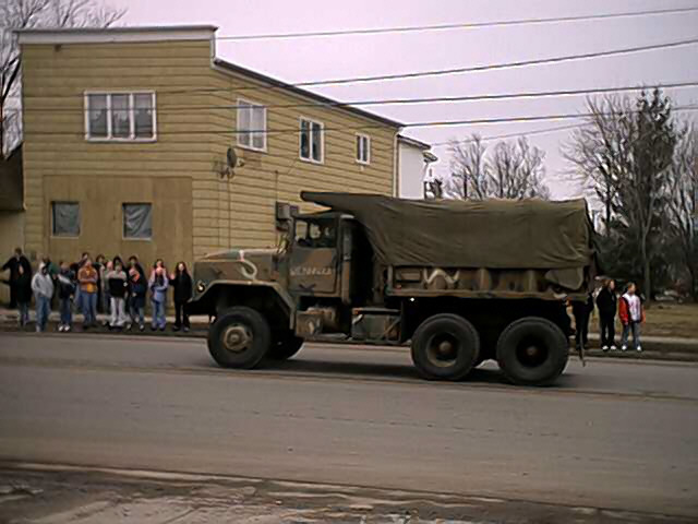 Medford, WI: 1 Picture of The 724th Engineer Battalion Leaving Town on 03/18/2003 when "Called To Duty" (Building in Background Used to be The Broadway Store") (Sorry, No Return Pictures...Had To Work That Day)