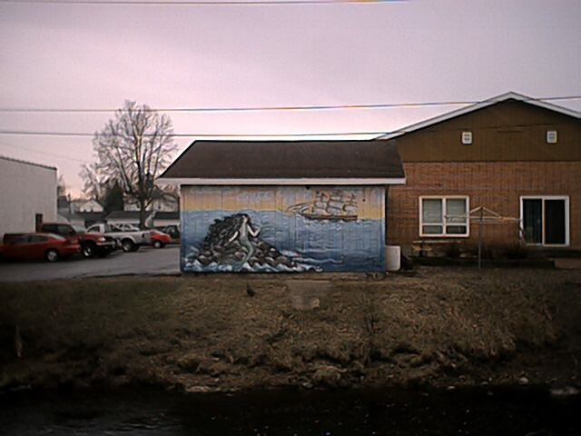 Medford, WI: Mural On The Back Side Of A Building Next To The Star News (Local Newspaper here in Medford, WI.) (Taken 04/15/2004)