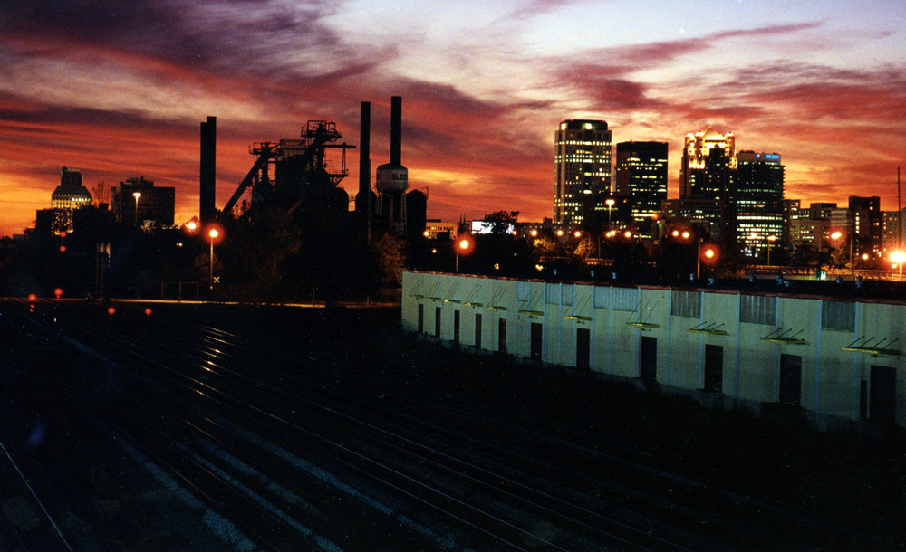 Birmingham, AL: Sloss Furnace and Downtown Birmingham at Sunset. When Sloss was operating, this was Smoke City.
