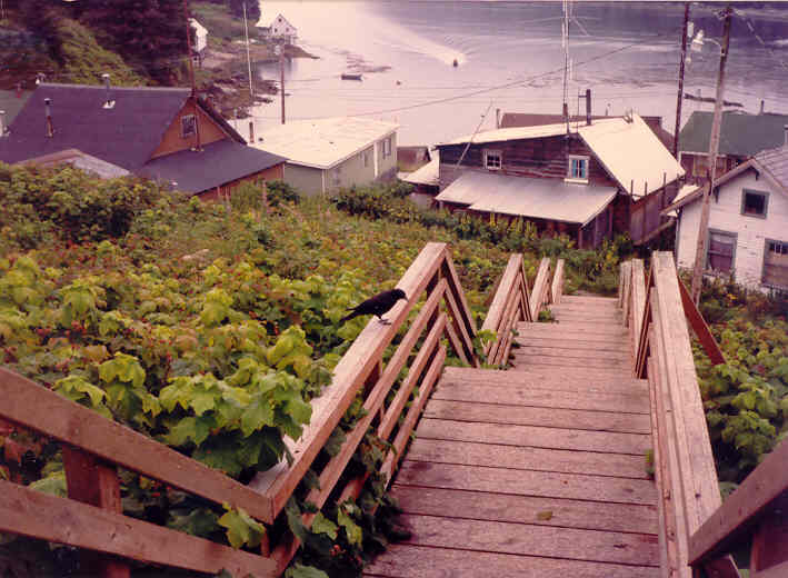 Angoon, AK: Angoon, Alaska as seen from steps above the town. Taken August 1988