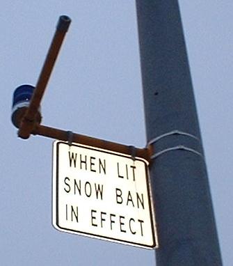 Chelsea, MA: one of the light posts in chelsea....how in the wurld do u ban snow?