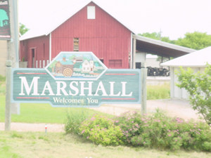 Marshall, WI: Marshall Sign shows the Mill and dam on the Marshall Mill Pond.
