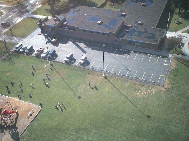 Detroit, MI: A picture of the "Michigan Treasure Hunters" and their metal detectors searching for hidden booty at Yost Elementary School on Detroits West side. Aerial pic by Doug at AerialCamsByDoug@aol.com