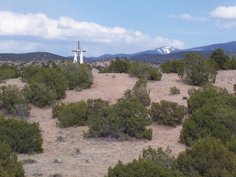 Chimayo, NM: ttCross against the backdrop of the Sangre De Cristo Mountains on 503 south of Chimayo.