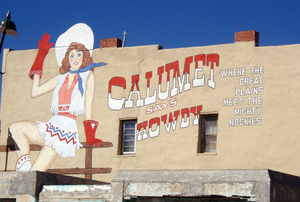 Las Vegas, NM: "Calumet Says Howdy!" Mural painted on Grand Avenue building for the movie Red Dawn. A Las Vegas, NM icon!