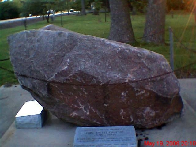 Neelyville, MO: Rock found in Little Black River in the 1980's. It was originally thought to be a meteorite. Less than half of the rock was removed from the river. Further investigation proved that it was a counterweight for a dreadging machine that was typically used during the 1930s and 40s.