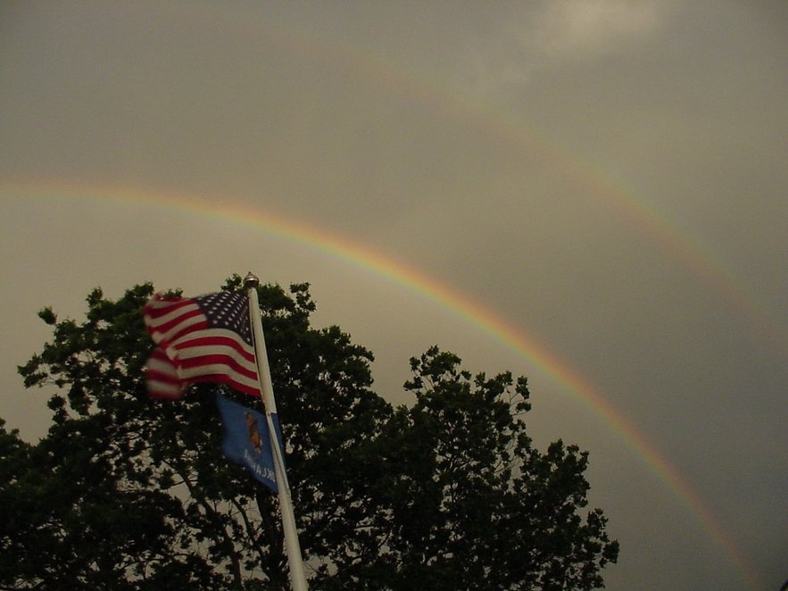 Cushing, OK: Flag with rainbow.