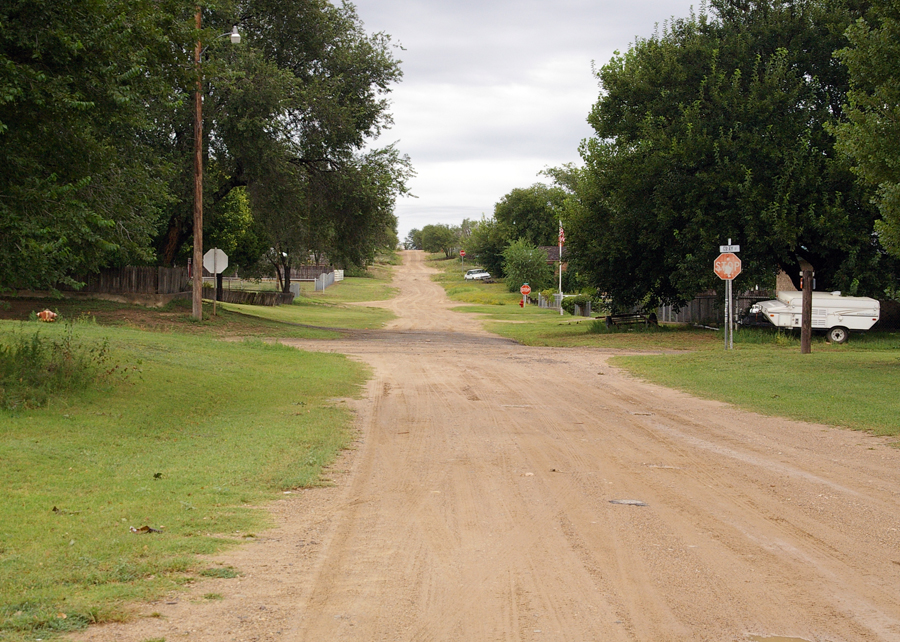 Lefors, TX: RESIDENTIAL STREETS. A recent retiree walking her dog said she had happily given up a large city for Lefor's rural quiet and beauty.